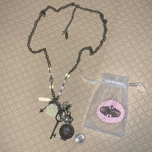 Plunder long bronze tone diffuser locket necklace